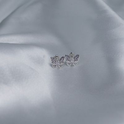 Aretes de mariposa con detalle zirconia blanca al centro