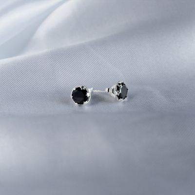 Aretes zirconia redonda con detalle de estrellas