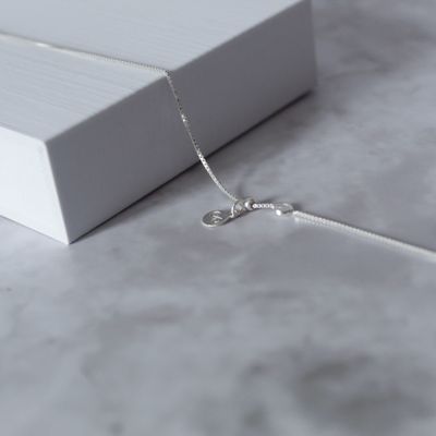 Tobillera con infinito y detalle de zirconia estilo de cadena box