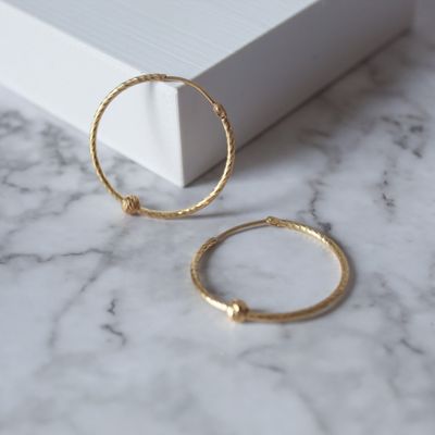 Argollas redondas diamantada con bolita