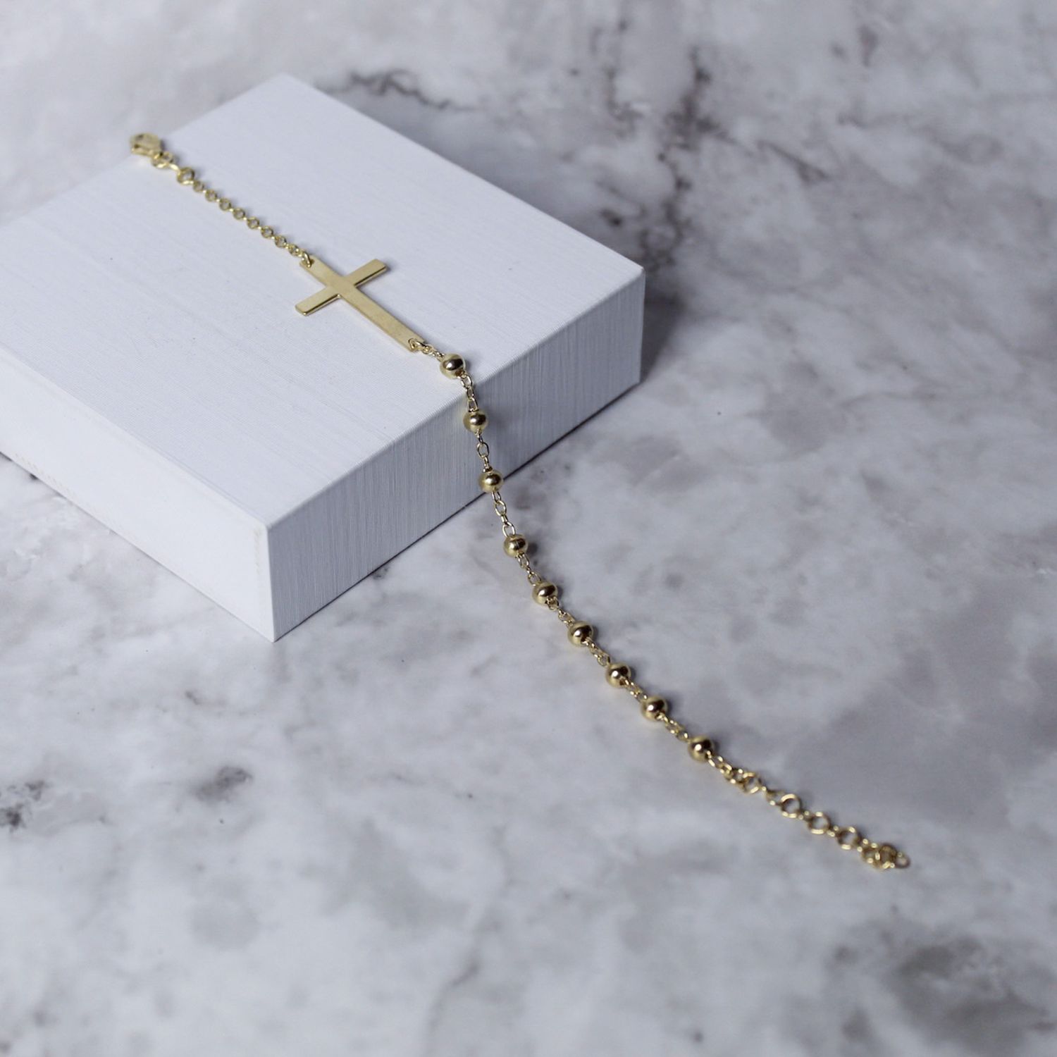 Pulsera de bolitas con cruz en plata italiana gold