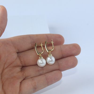 Aretes de broche antiguo con perla y baño de oro de 18K