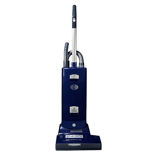 High-gloss graphite SEBO Automatic X8 upright vacuum showing its extra-wide 15-inch cleaning deck and front LED tracking head