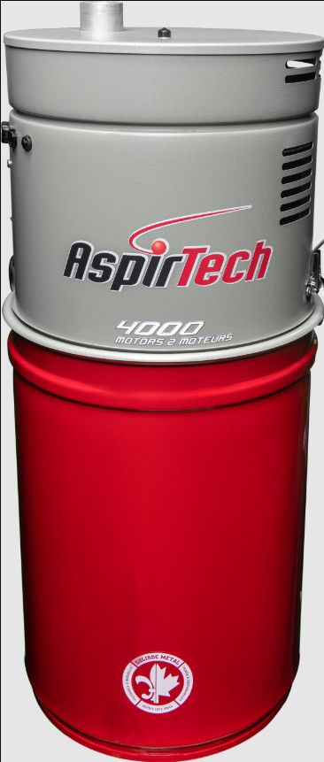 AspirTech Model 4000 Dual Motor 240V steel central vacuum power unit mounted on wall frame.