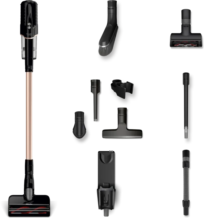 The elegant Obsidian Black Miele Duoflex HX1 stick vacuum charging on its SpeedLock wall bracket inside a modern kitchen.
