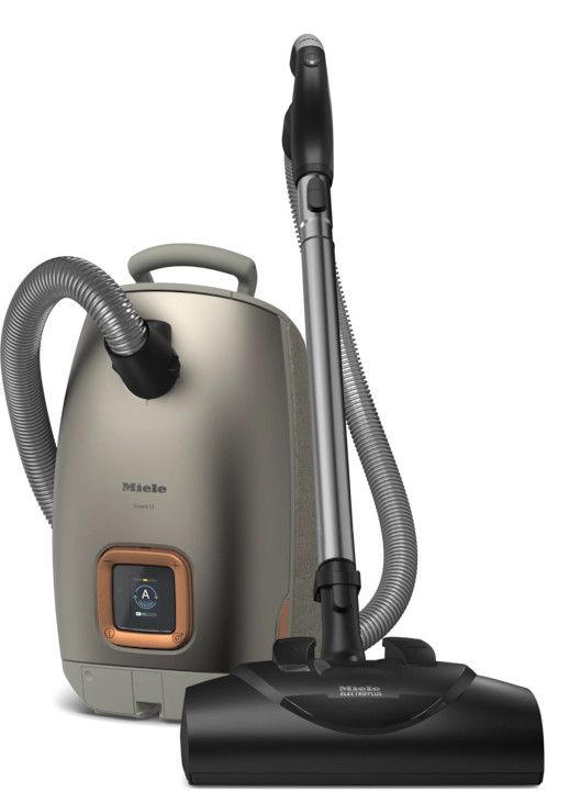 Titanium Pearlfinish Miele Guard L1 Electro canister vacuum showing the digital LCD display and SEB 228 powerhead.