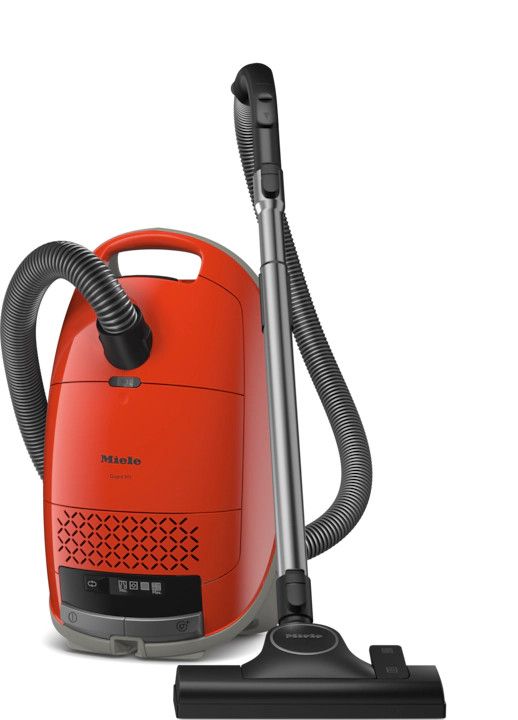 Terra Red Miele Guard M1 canister vacuum showing the multi-surface AllTeQ floorhead attachment.