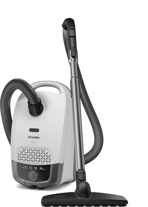 Brilliant White Miele Guard S1 Parquet Flex stick vacuum showing its slim vertical body and SBB 300-3 floor brush.