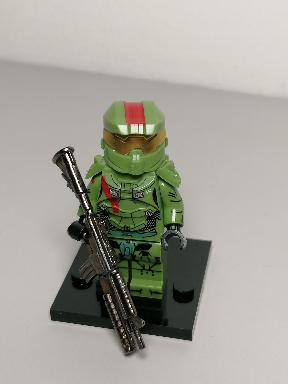 Halo minifigure with metal weapon