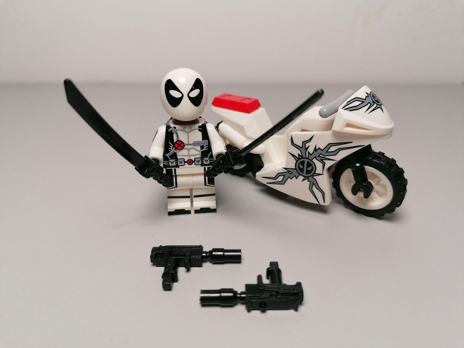Deadpool minifigure with moto From Marvel Comics