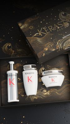 Лимитирана подаръчна кутия Première за увреден коса с продукти в размер за пътуване.