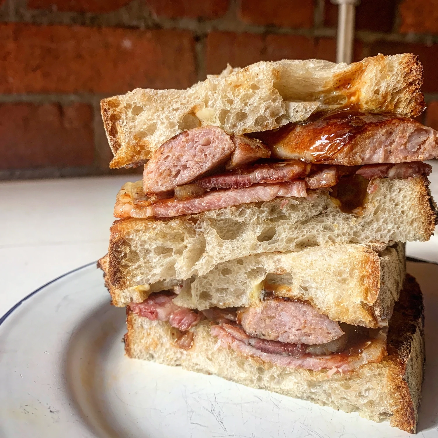 Bacon &amp; Sausage Sandwich