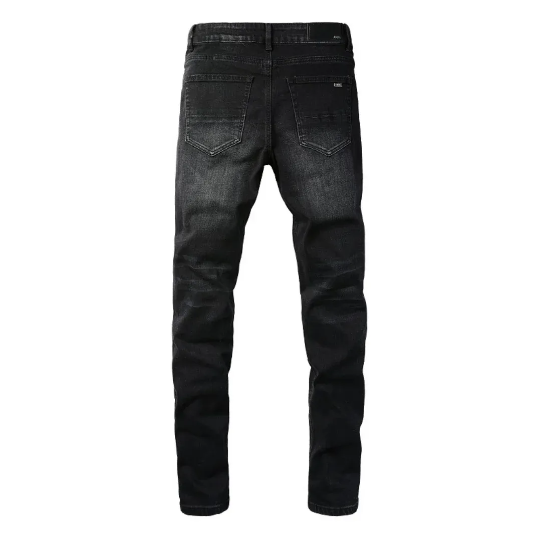 AMIRI BLACK RIPPED JEANS