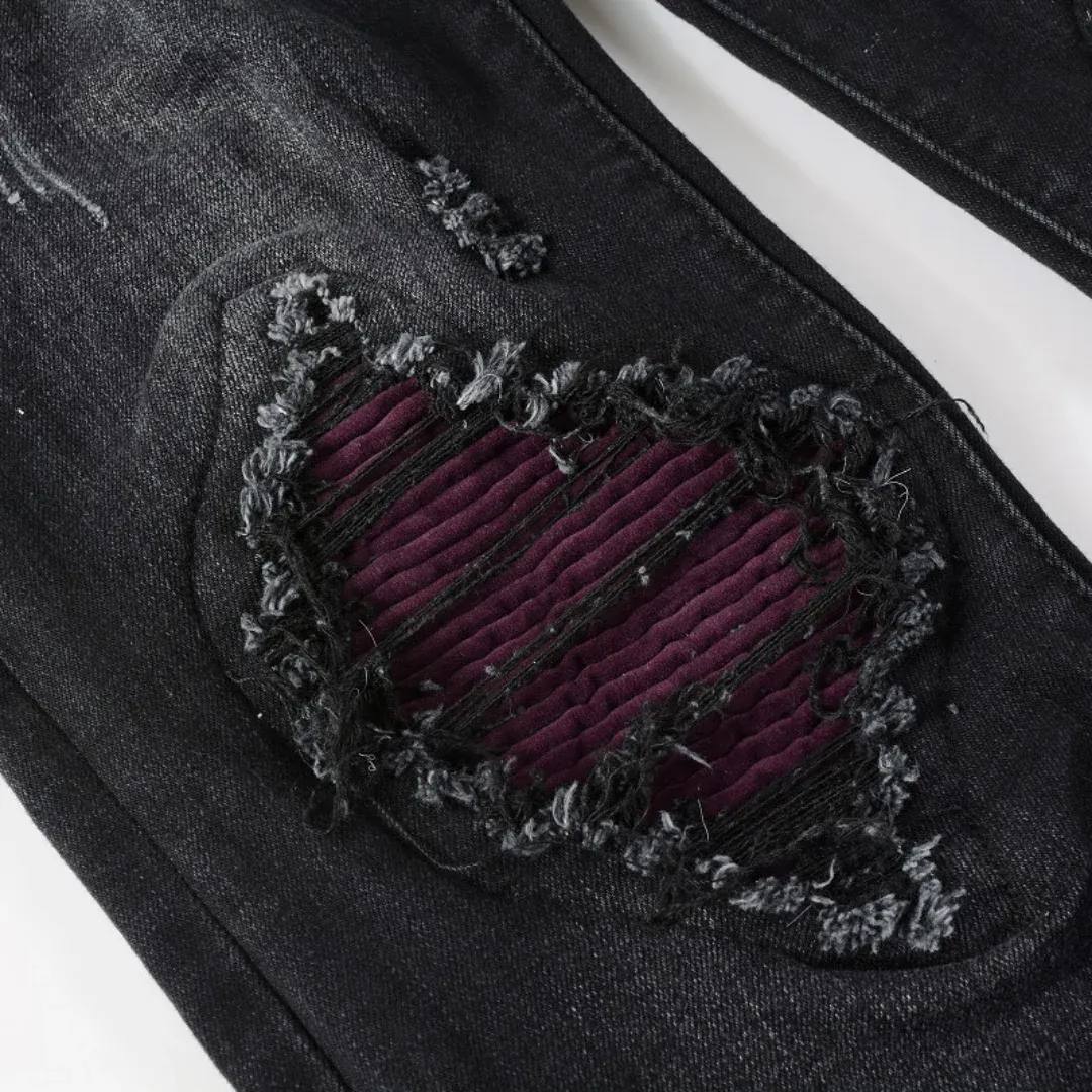 AMIRI BLACK RIPPED JEANS