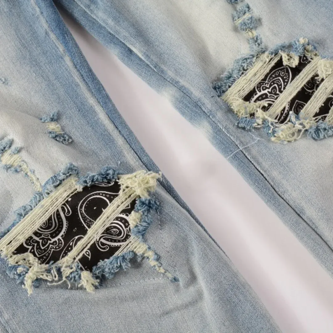 AMIRI BLUE DISTRESSED JEANS