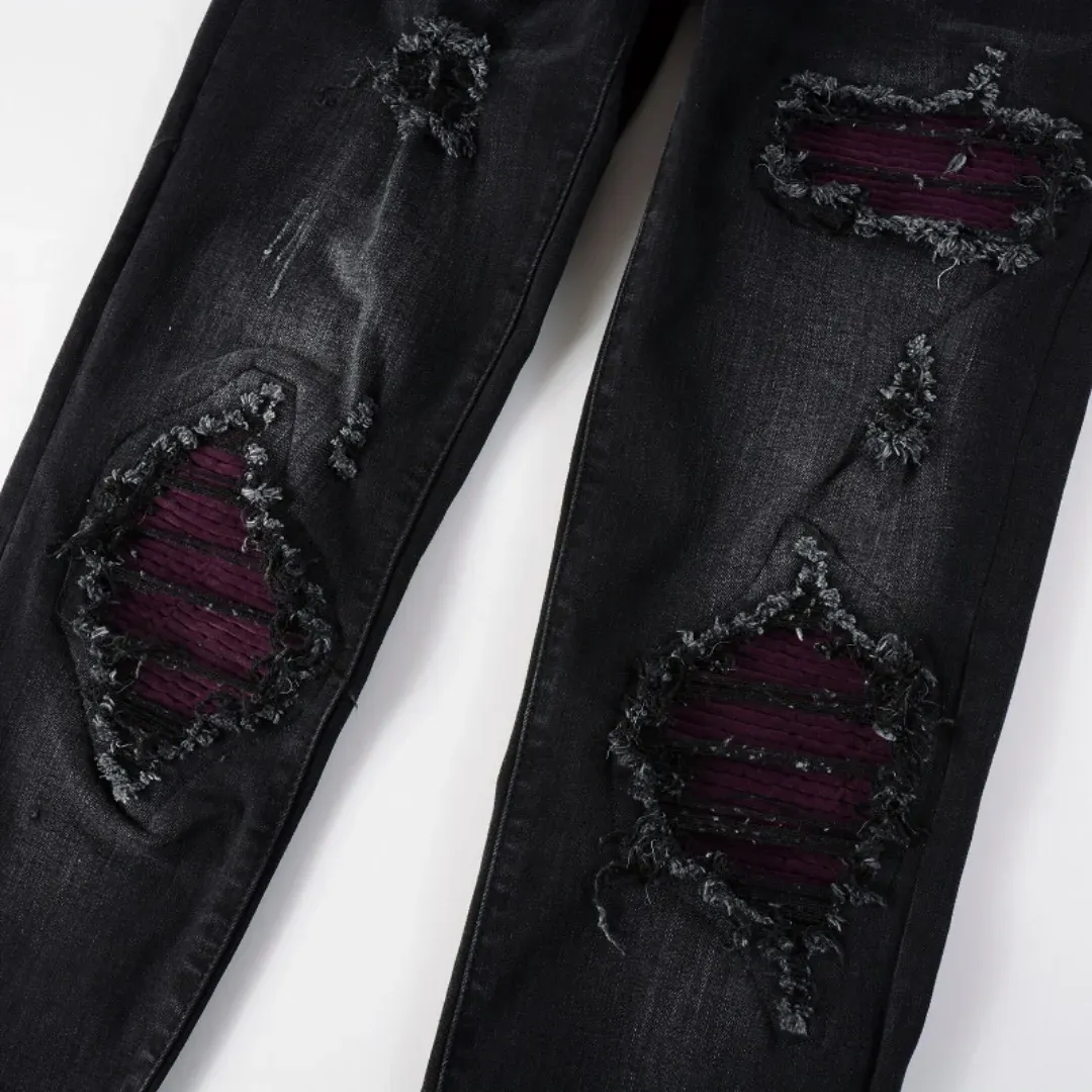AMIRI BLACK RIPPED JEANS