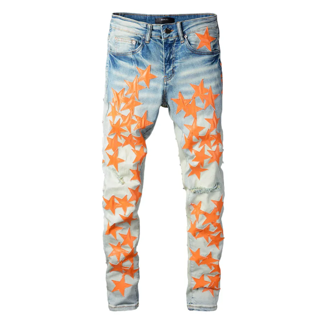 AMIRI ORANGE STAR PATCH JEANS