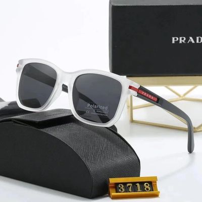 PRADA SUNGLASSES