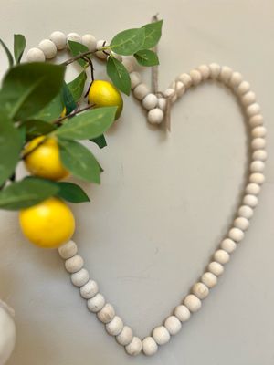 Houten kralen hart