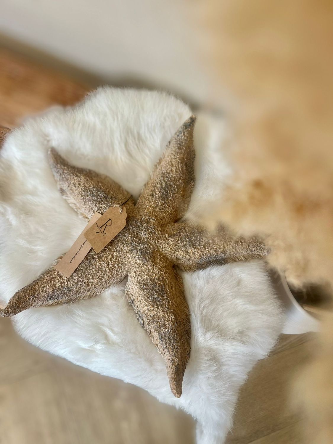 Beige/ gouden zeester