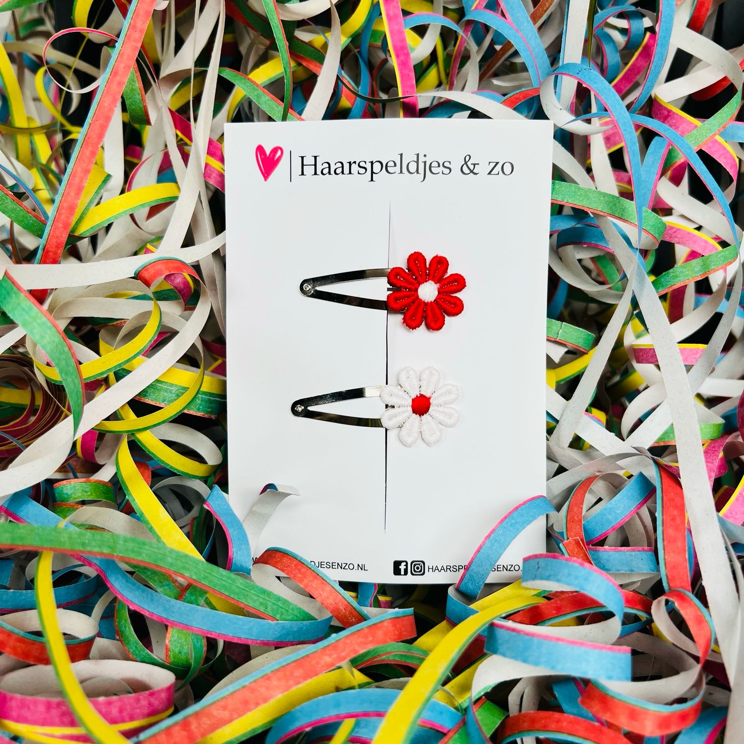 Klikklakspeldjes met rood/witte madeliefjes - carnaval - Ut Malse Arckeldurp — 5 cm