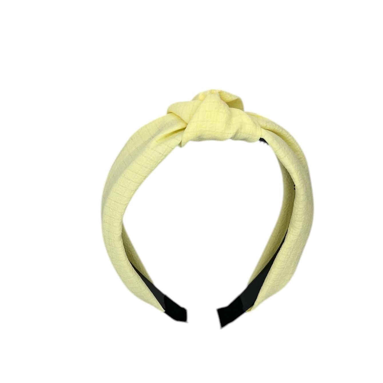Diadeem - stof - haarband - met knoop - zachtgeel