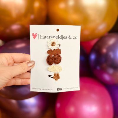 Baby haarspeldjes - mini - 2cm groot - voor de eerste lokjes haar - imitatieleer - bloemetjes - hartjes - sterretjes - bruin