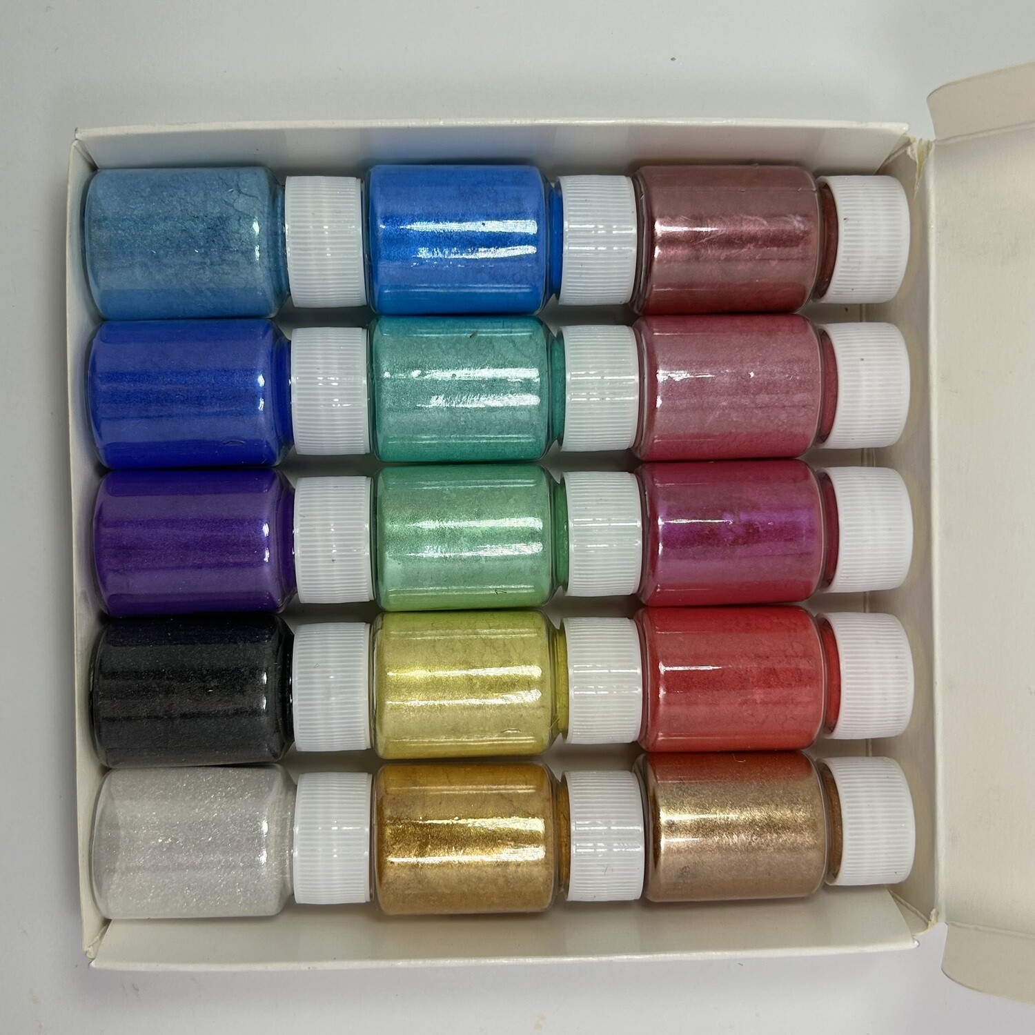 Caja de 15 polvos de mica de 10 gramos c/u