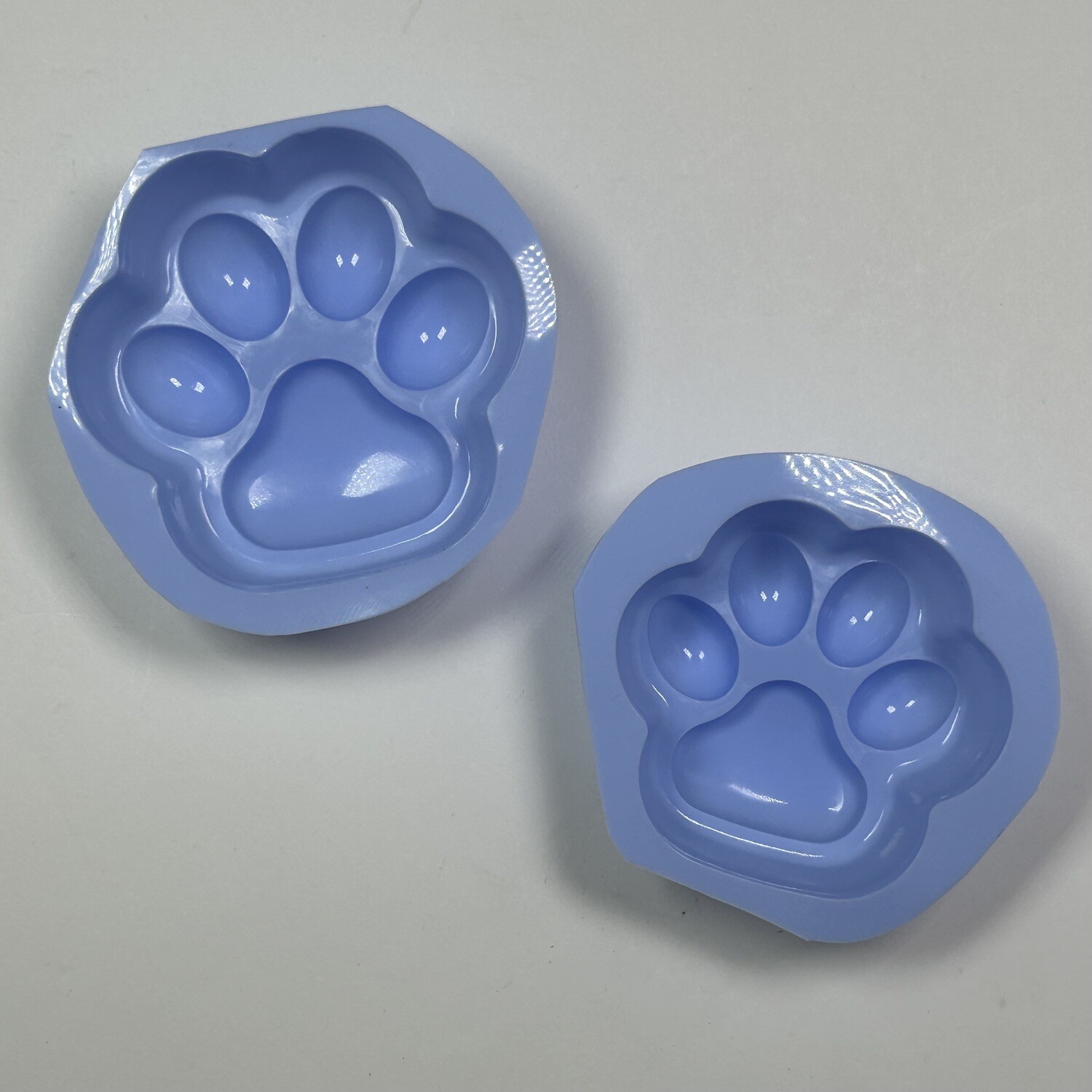 Set de 1 molde de silicon de huellitas de gato con volumen.