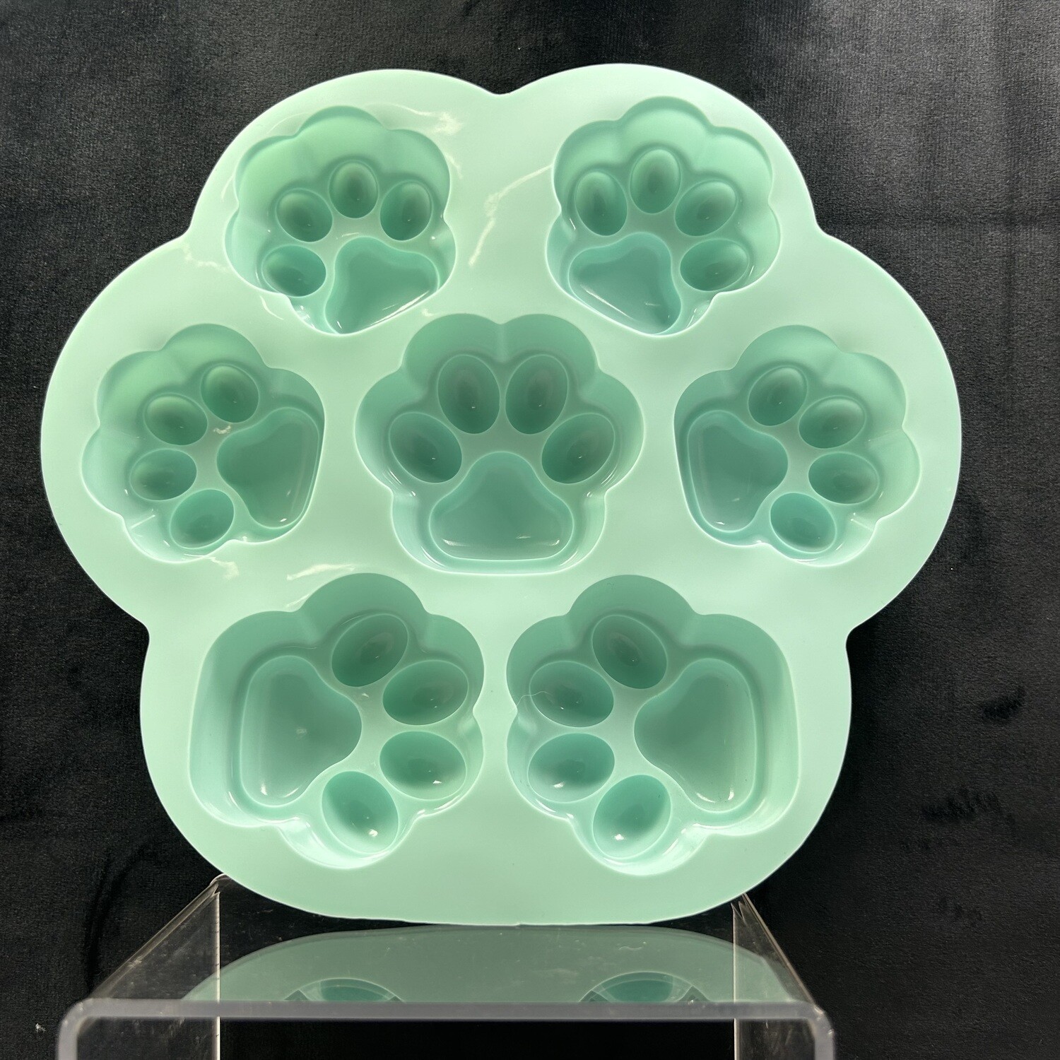 Molde silicon brillante 7 huellitas.