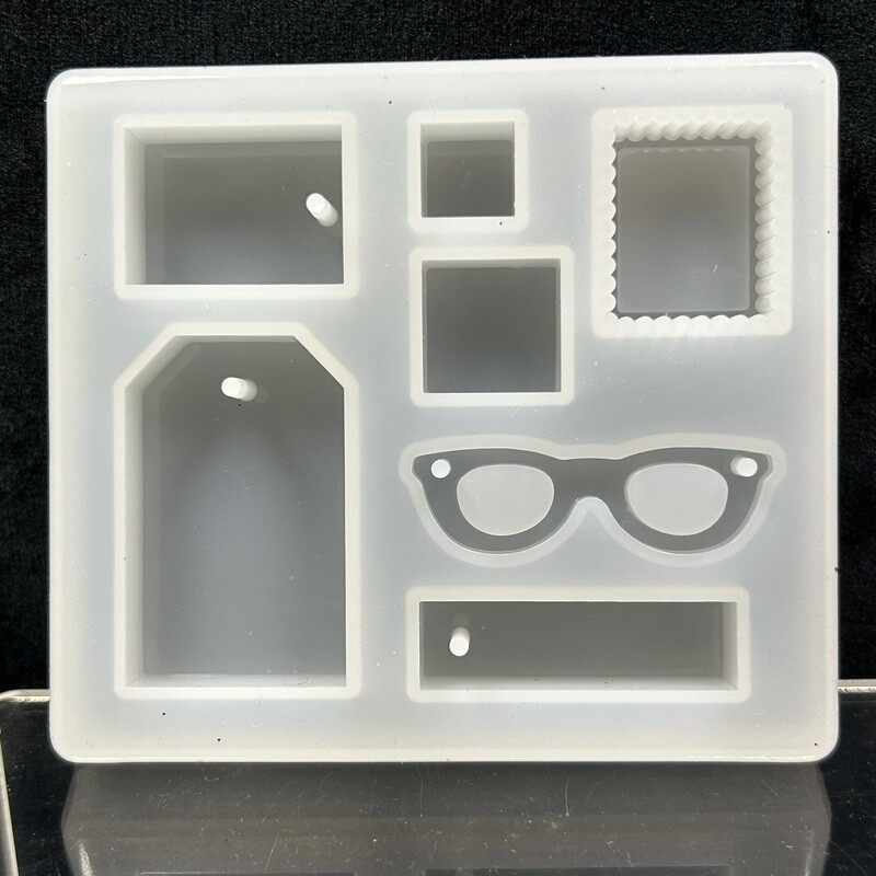Molde dijes lentes 10x10 cm