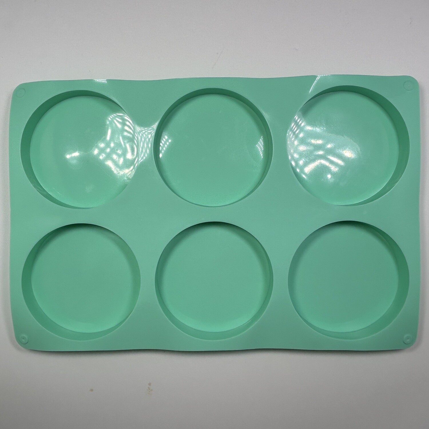 Molde de silicon brillante 6 porta vasos redondos de 10 cm de diámetro c/u.