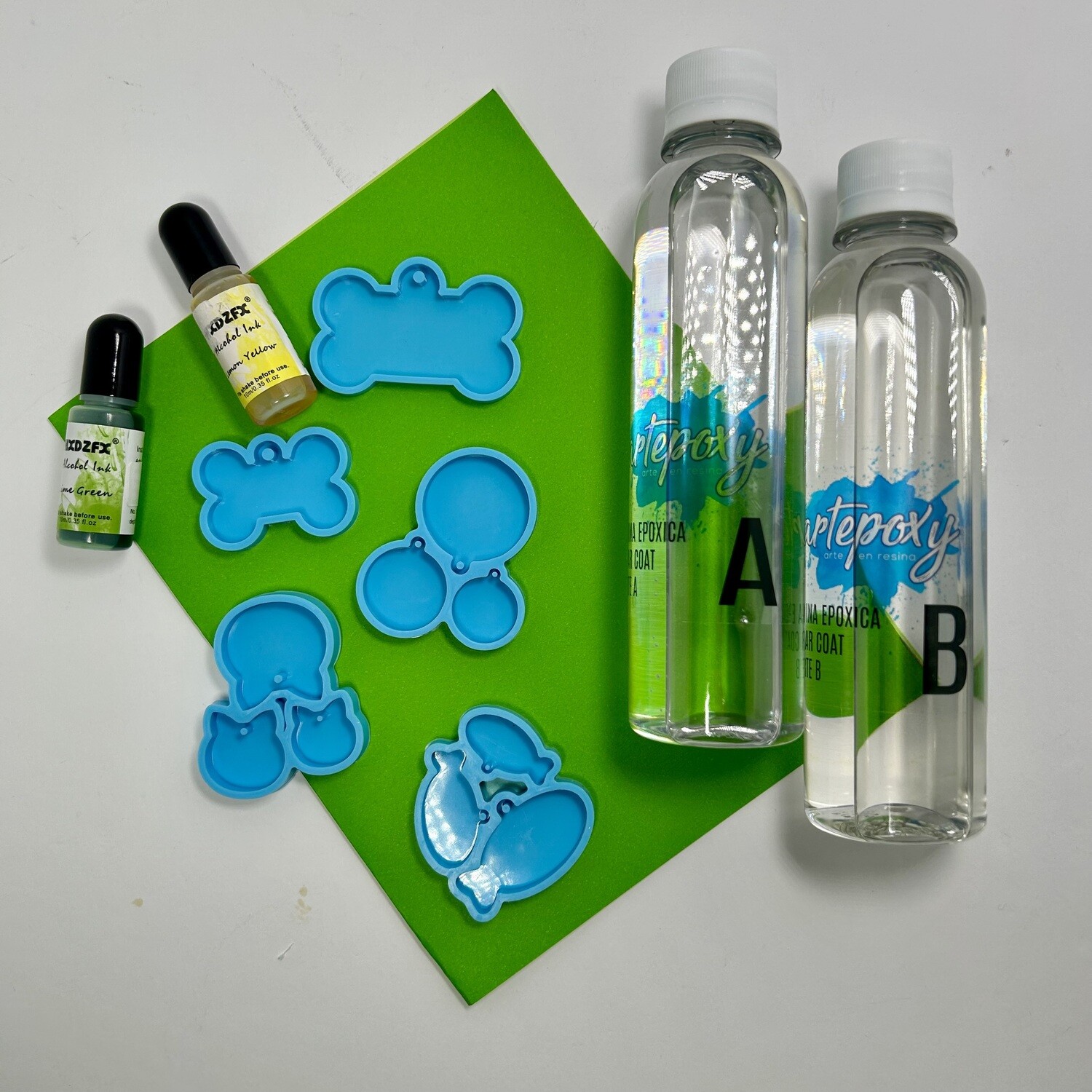 Molde plaquitas mascotas 
Resina 500ml. 
2 tintas de alcohol