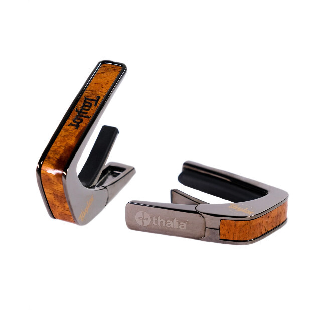 Thalia Officially Licensed Taylor AAA Curly Hawaiian Koa Capo w/Logo Engraving