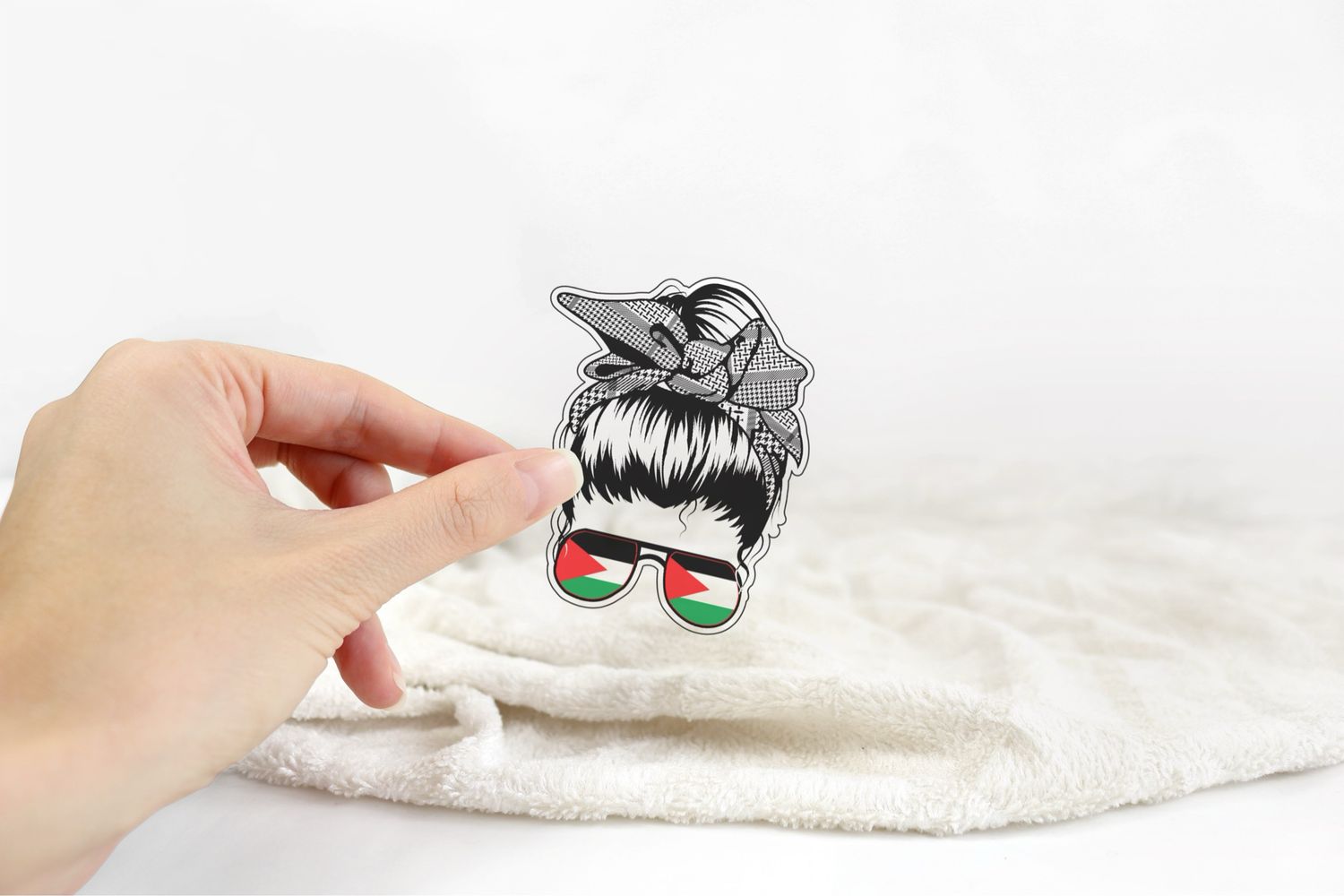 Woman With High Bun and Sunglasses