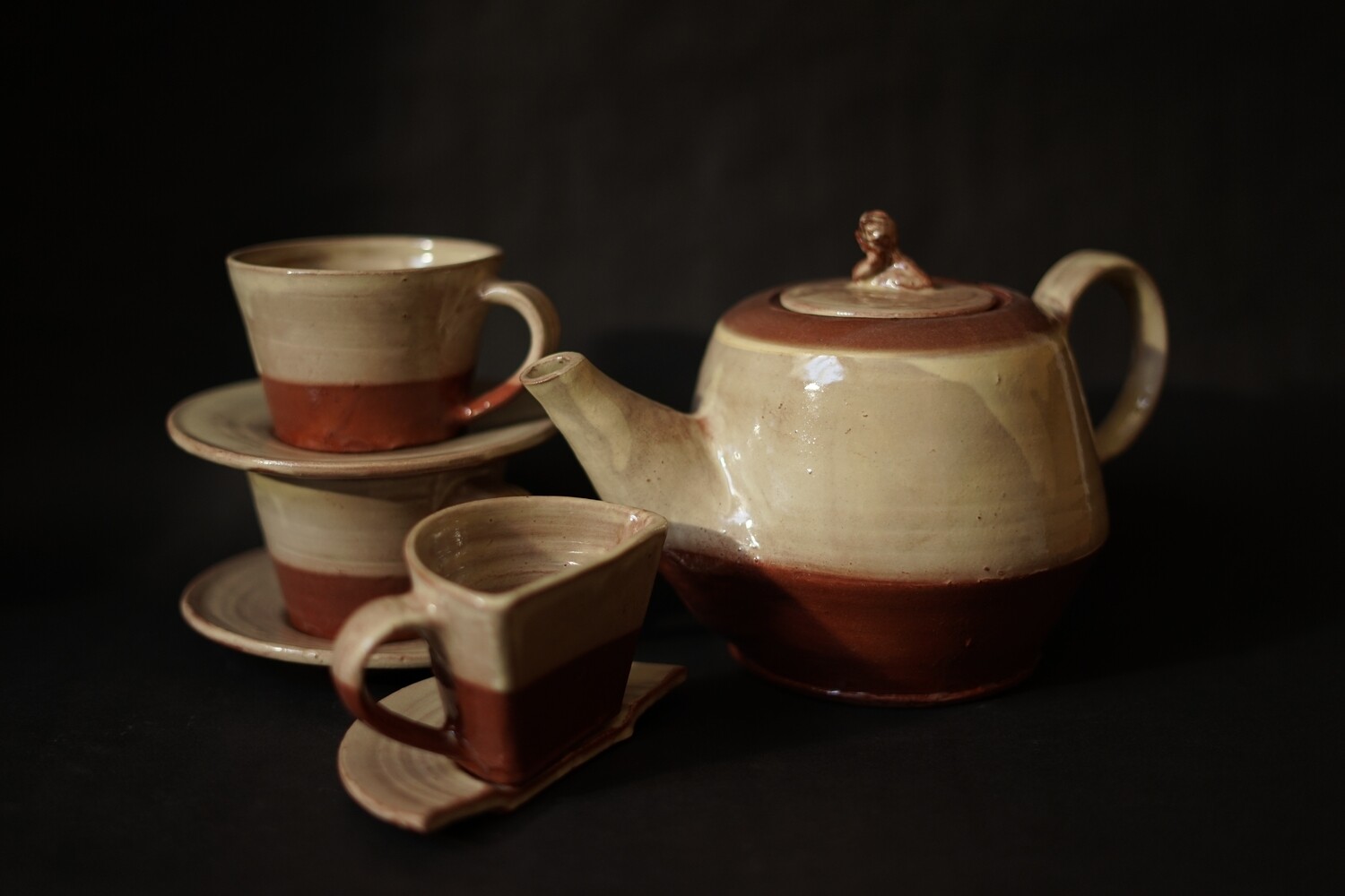 Teaset with a mournful man