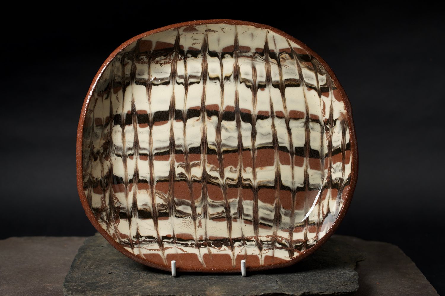 Experimental shallow dish with handles