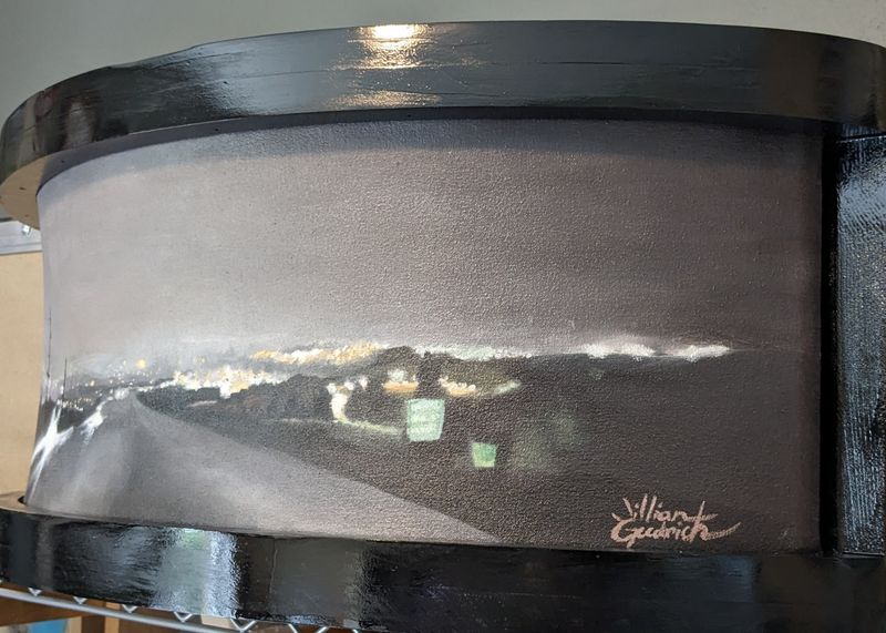 City Glow in Heavy Clouds