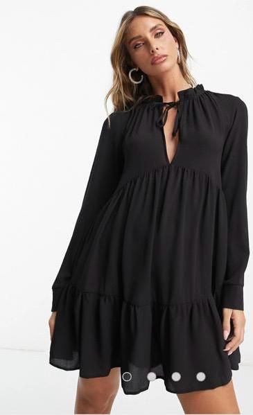 Vestido mini con ajuste al cuello