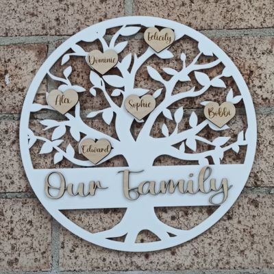 Custom timber family tree wall art with engraved names on hearts or leaves