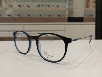 Michael Optical tondo nero-blu con asta a Z Michael Optical tondo nero-blu con asta a Z