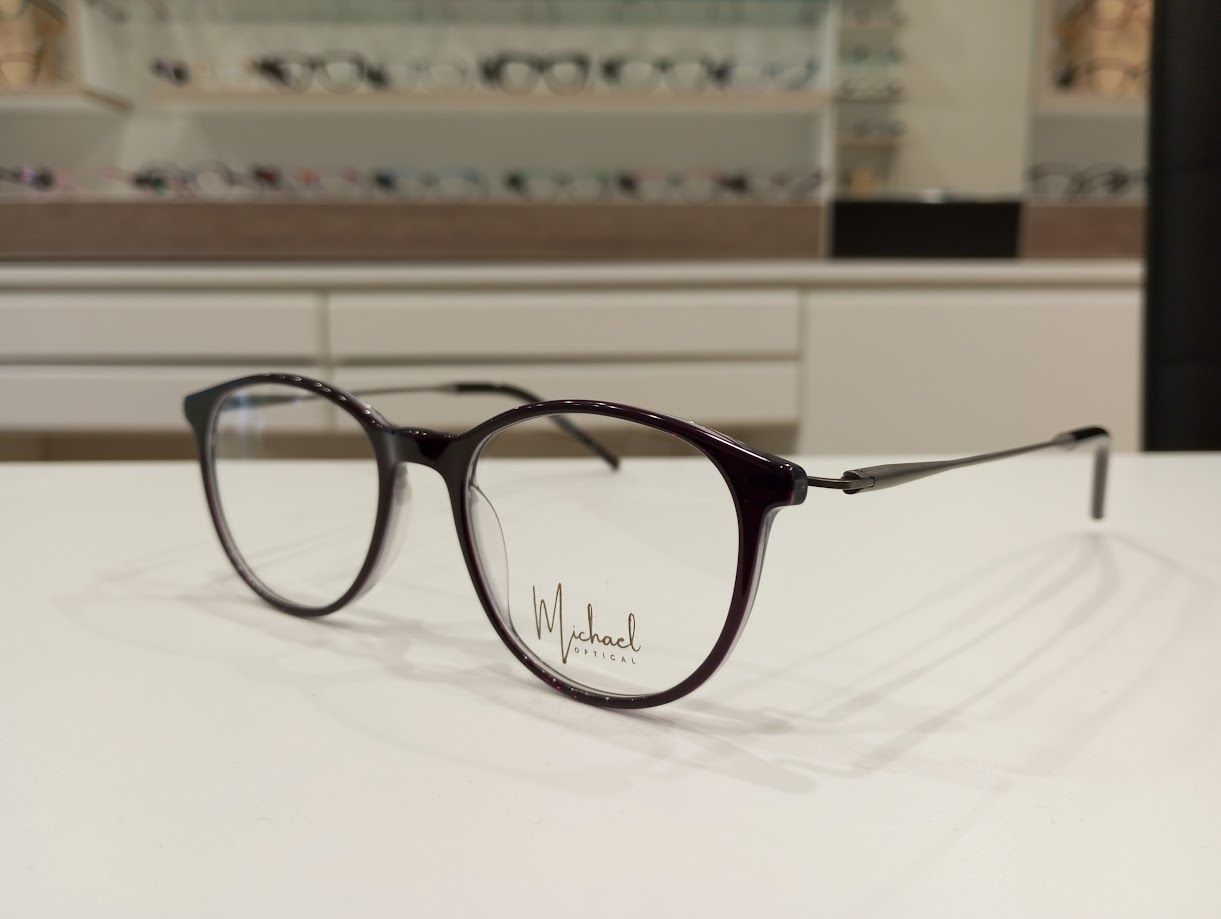 Michael Optical tondo rosso con asta a Z