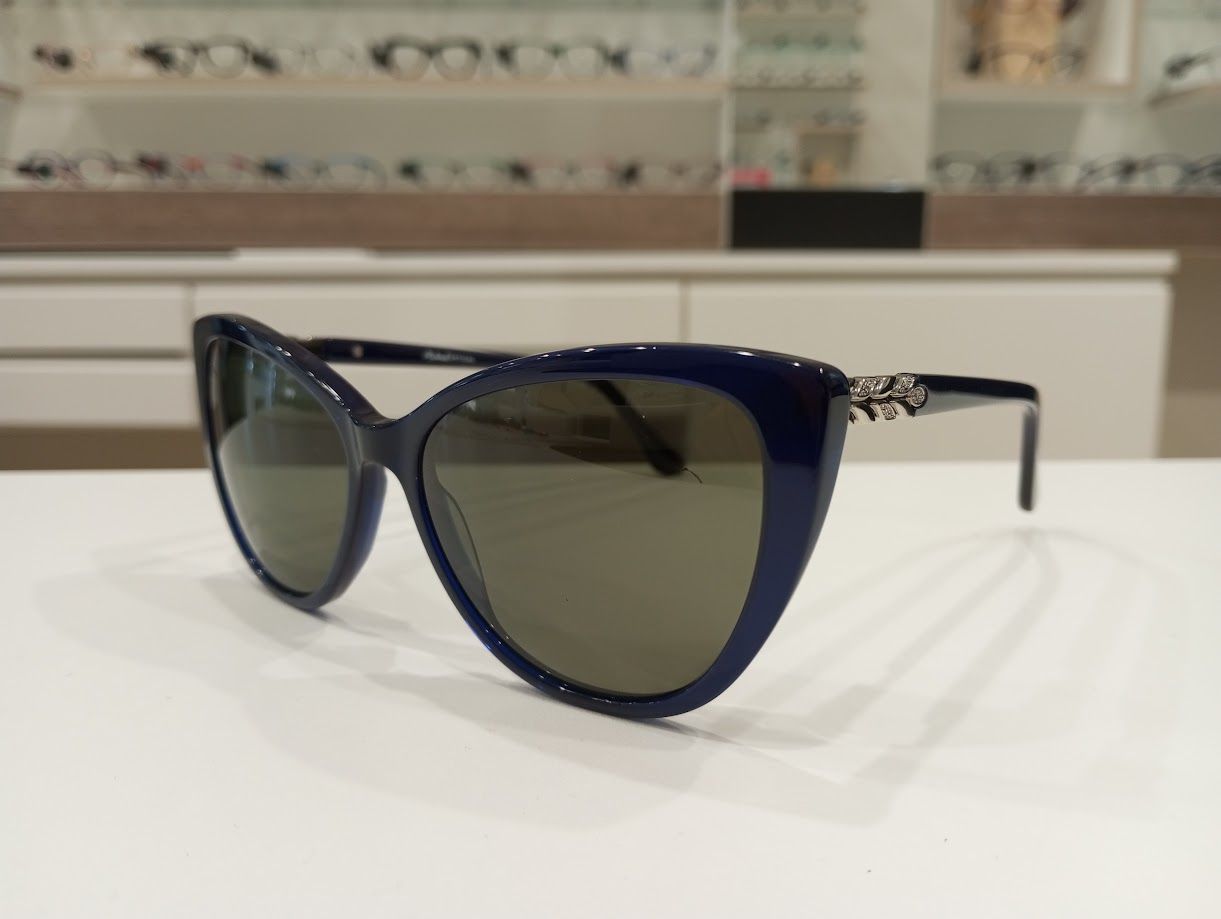 Michael Optical da sole a gatto blu con forma a fiore sull'asta
