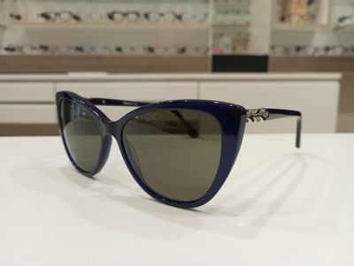 Michael Optical da sole a gatto blu con forma a fiore sull'asta