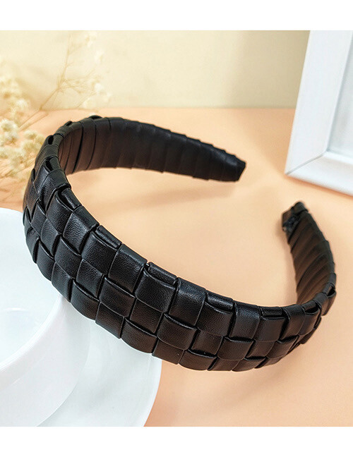 Diadema negra de cuero trenzada