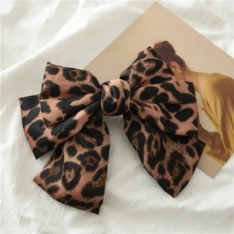 Dusty rose cheetah print hair bow