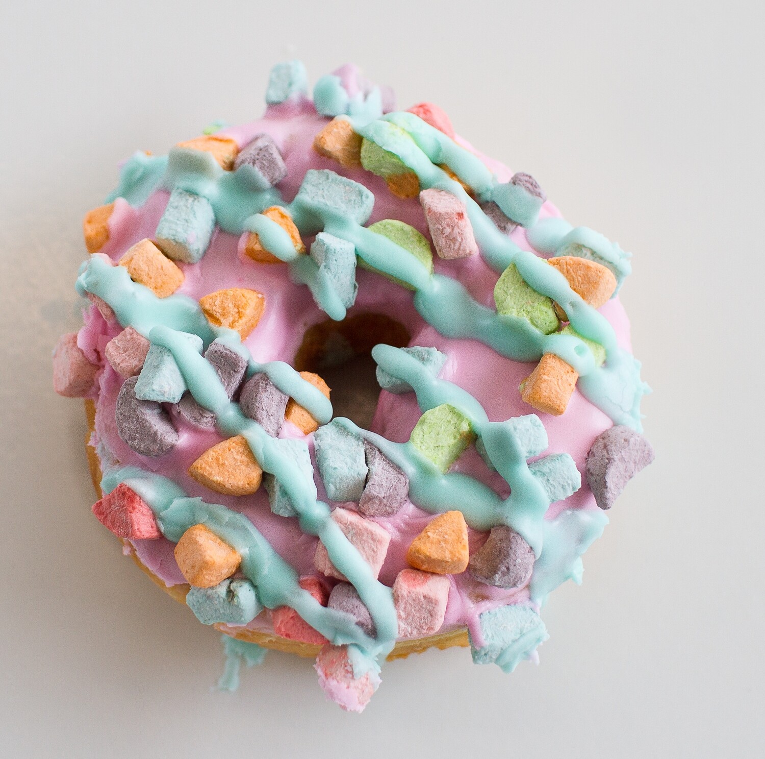 Yeast Donut, Vanilla Icing, Lucky Charm Topping (Single Donut) Yeast Donut, Vanilla Icing, Lucky Charm Topping (Single Donut)