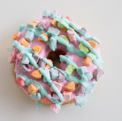 Yeast Donut, Vanilla Icing, Lucky Charm Topping (Single Donut)