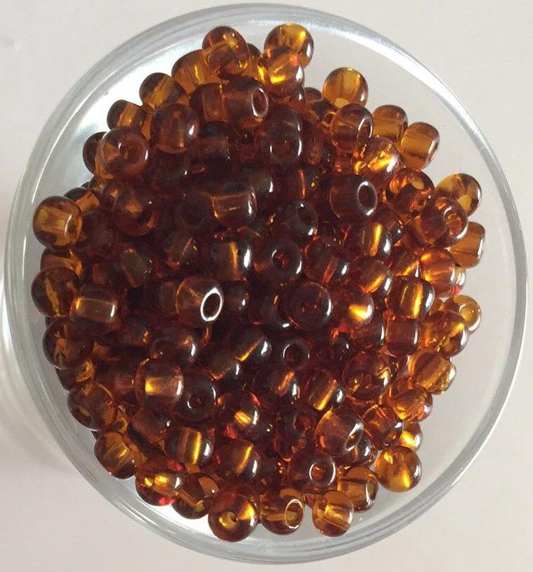 Seed Bead - Translucent Dark Amber 6/0.