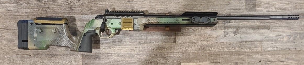 *USED* TIKKA T3X 24" 10+1 BOLT-ACTION 6.5 CREEDMORE RIFLE, BLK/CAMO, COMES W/ MDT XRS CHASSIS, 2 MAGS, NO BOX
